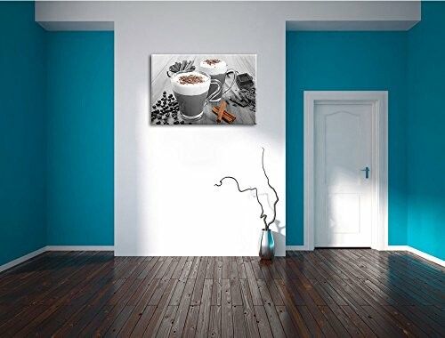 Moderne kamer met koffiekunst aan de muur.